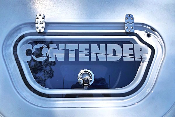 Upgraded livewell lid with custom Contender branding on a 2018 Contender 24 Sport