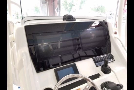 Completed Regulator dash panel with switches, gauges, and marine electronics