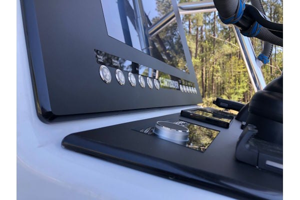Close-up view of a custom dash panel built for a Contender 24 Sport