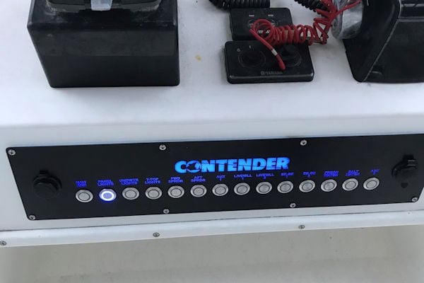 Laser-etched switch panel designed for a Contender boat