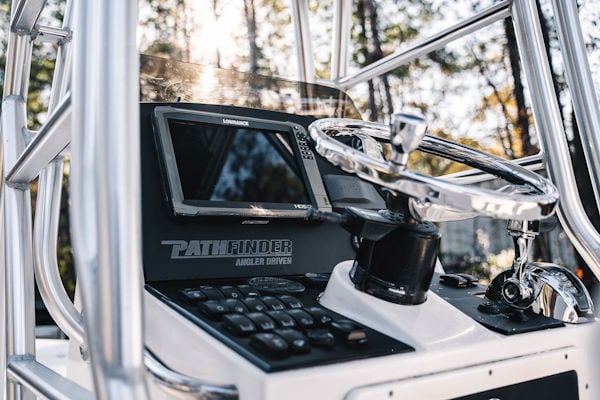 Upgraded helm layout on a 2008 Pathfinder 2200T with custom dash panel and integrated electronics