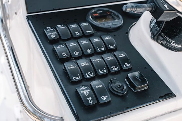 Custom switch panel upgrade on a 2008 Pathfinder 2200T with organized rocker switches and clean layout