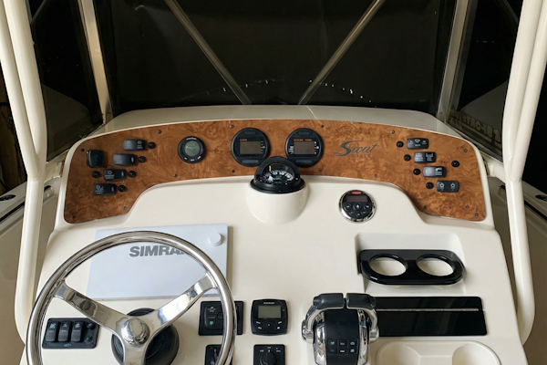 Custom dash panel replacement on a 2006 Scout 222 Sportfish with upgraded electronics and helm layout