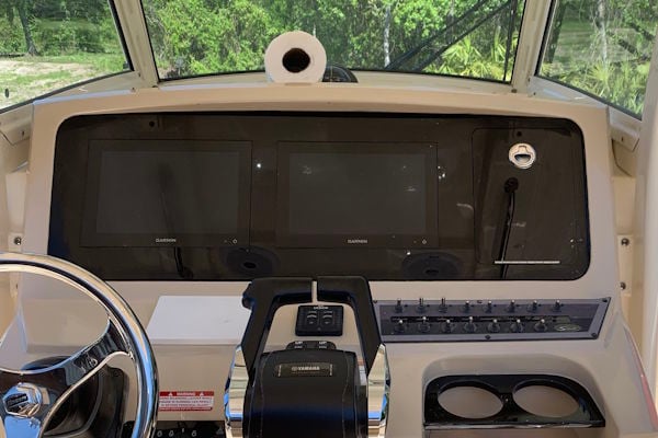 Blackout dash panel upgrade on a 2017 Scout 255 LXF with dual electronics layout and modern helm finish