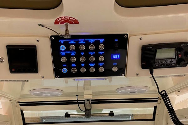 Blackout dash panel upgrade on a 2017 Scout 255 LXF with dual electronics layout and modern helm finish