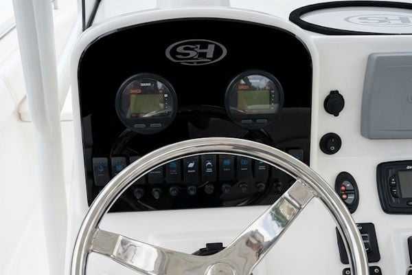 Custom dash panel upgrade on a 2013 Sea Hunt Ultra 234 helm with integrated gauges and rocker switches