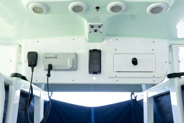 Overhead electronics and accessory panel replacement on a 2014 Sea Hunt Gamefish 25