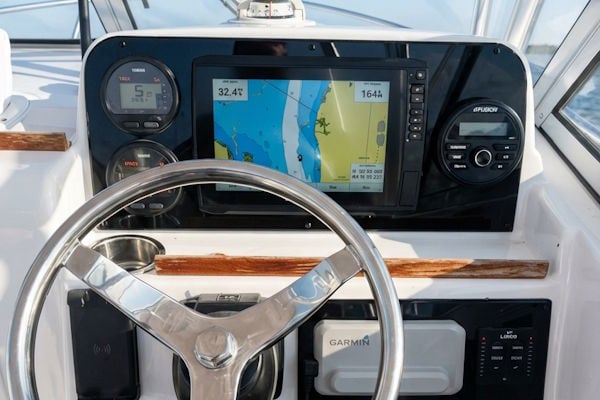Replacement dash panel on a 2014 Sea Hunt Victory 225 with modern electronics layout