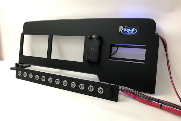 Custom Sea Hunt switch panel with blue backlit rocker switches installed below the helm