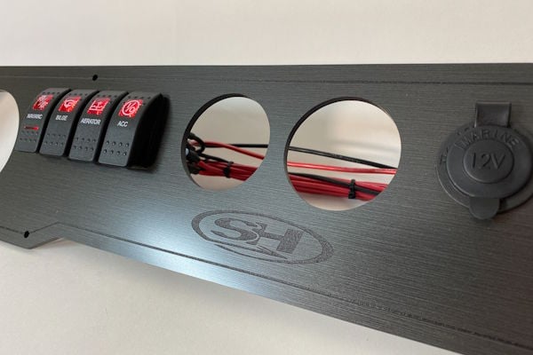 Dark Sheffield finish dash panel custom built for a Sea Hunt center console
