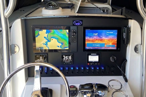 Custom black acrylic Southport dash panel with illuminated push button switches and modern helm design